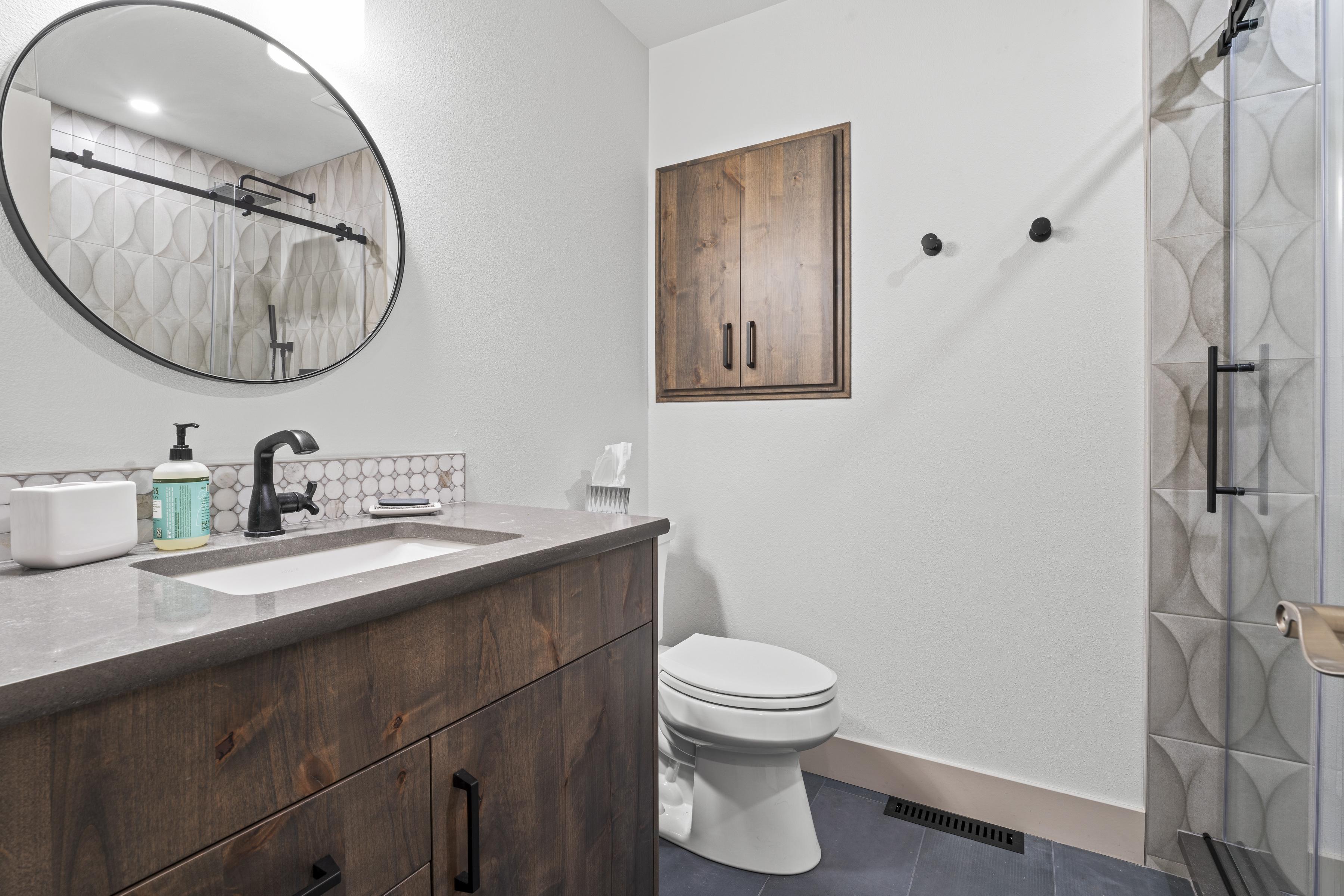 Bluebird Home bathroom tile and vanity detail